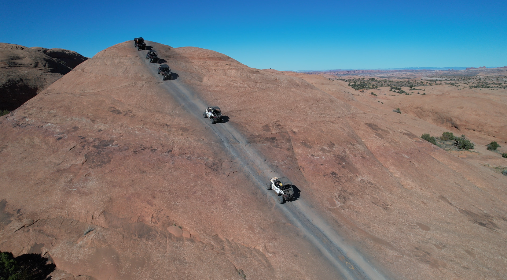 Hill climb on Moab's most iconic Hell's Revenge UTV tour
