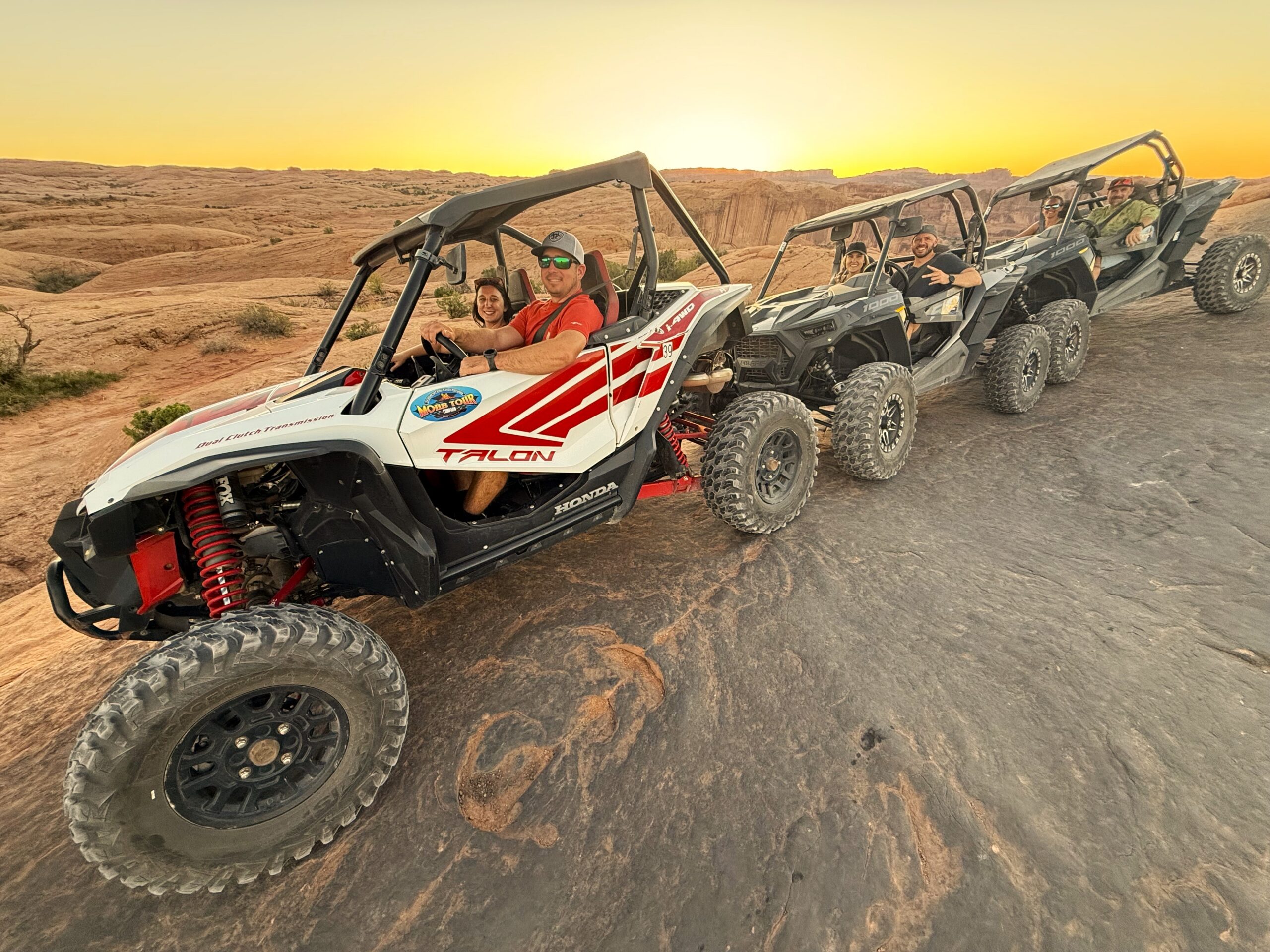 UTV tour group riding Hells Revenge in Moab Utah
